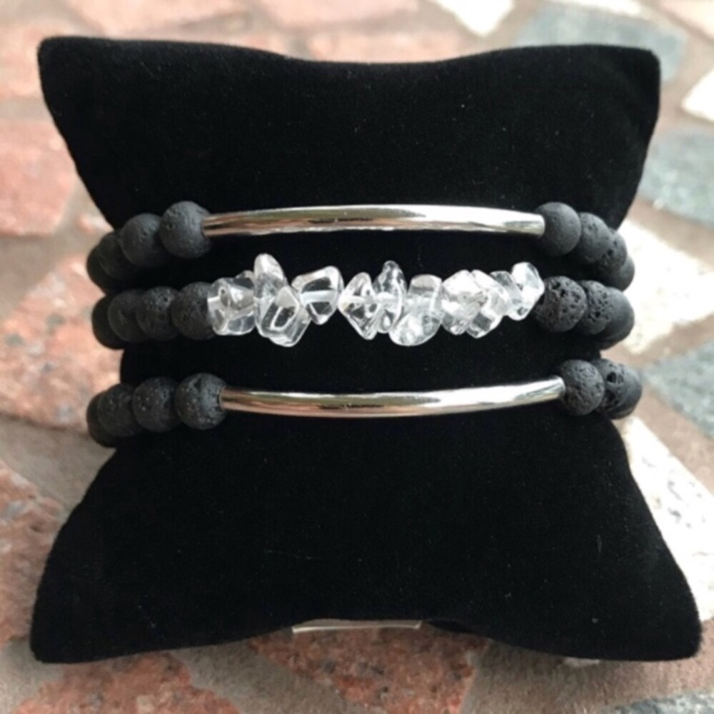Crystal quartz bracelets . Genuine crystal quartz chips & black lava rock beads